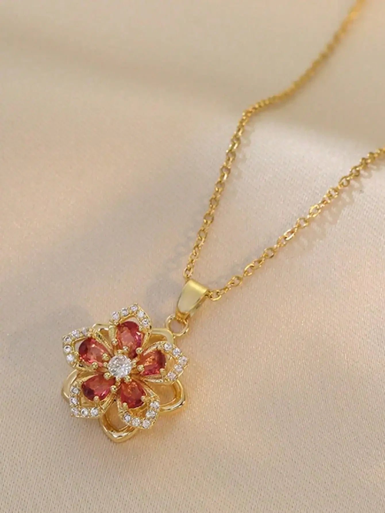 Plum Blossom Rotatable Necklace – Cubic Zirconia